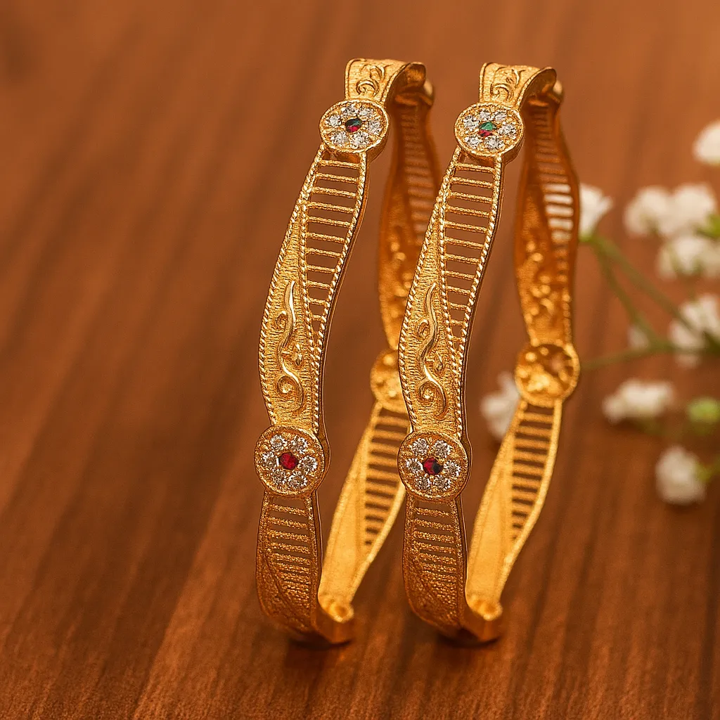 Classic engraved gold bangles with ruby center stones intricate ethnic design perfect for occasions