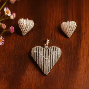 Heart shaped diamond pendant set with matching earrings for gifting