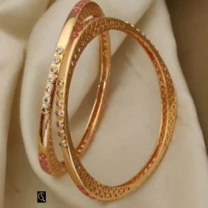 Rose gold kadli bangles with fine cutwork and cz detailing