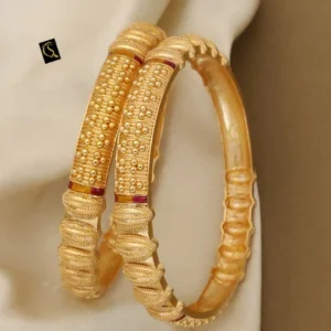 Traditional gold finish kadli bangles with textured handcrafted design