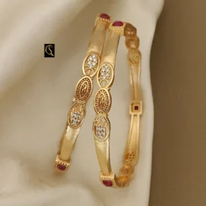 Classic slim kadli bangles with oval motifs and sparkling stone accents
