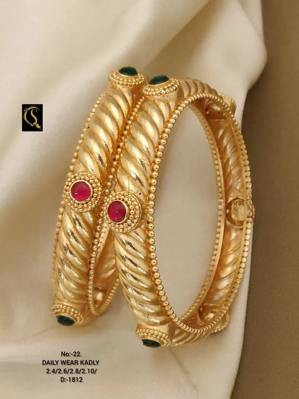 Premium rope style kadli bangles with vibrant ruby and emerald stones