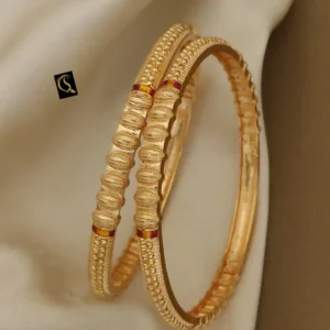 Golden textured kadli bangles with embossed bead pattern for daily wear