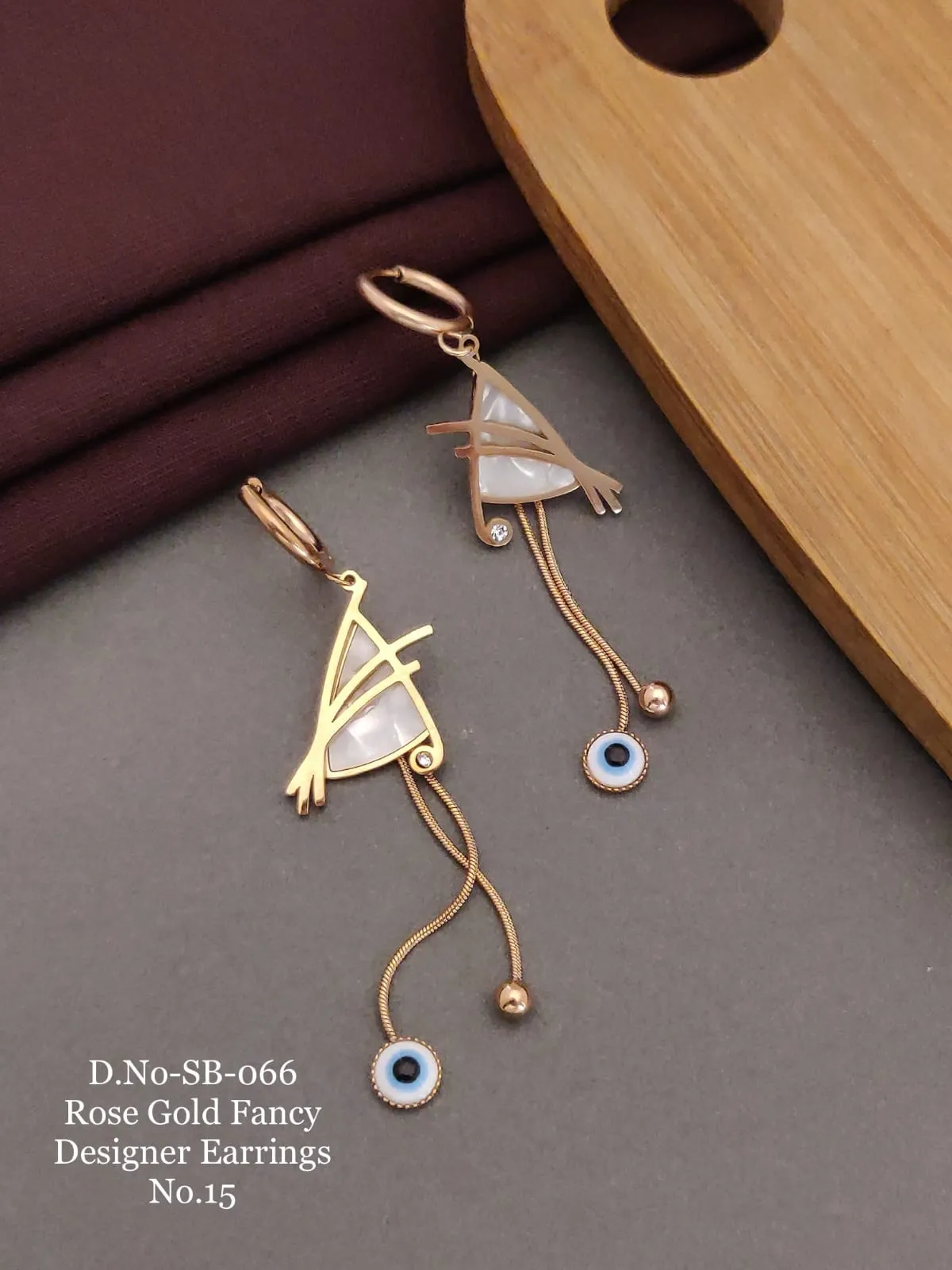 Rose gold long abstract designer earrings for modern outfits