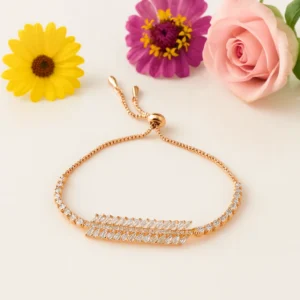 Rose gold adjustable bracelet with layered crystal baguette design