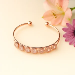 Rose gold cuff bracelet with round crystal cluster design