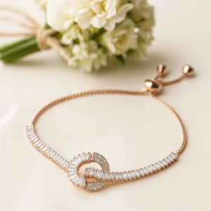 Rose gold bracelet with baguette crystal loop centerpiece