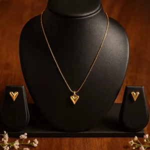 Gold polished heart design pendant set with matching earrings for women