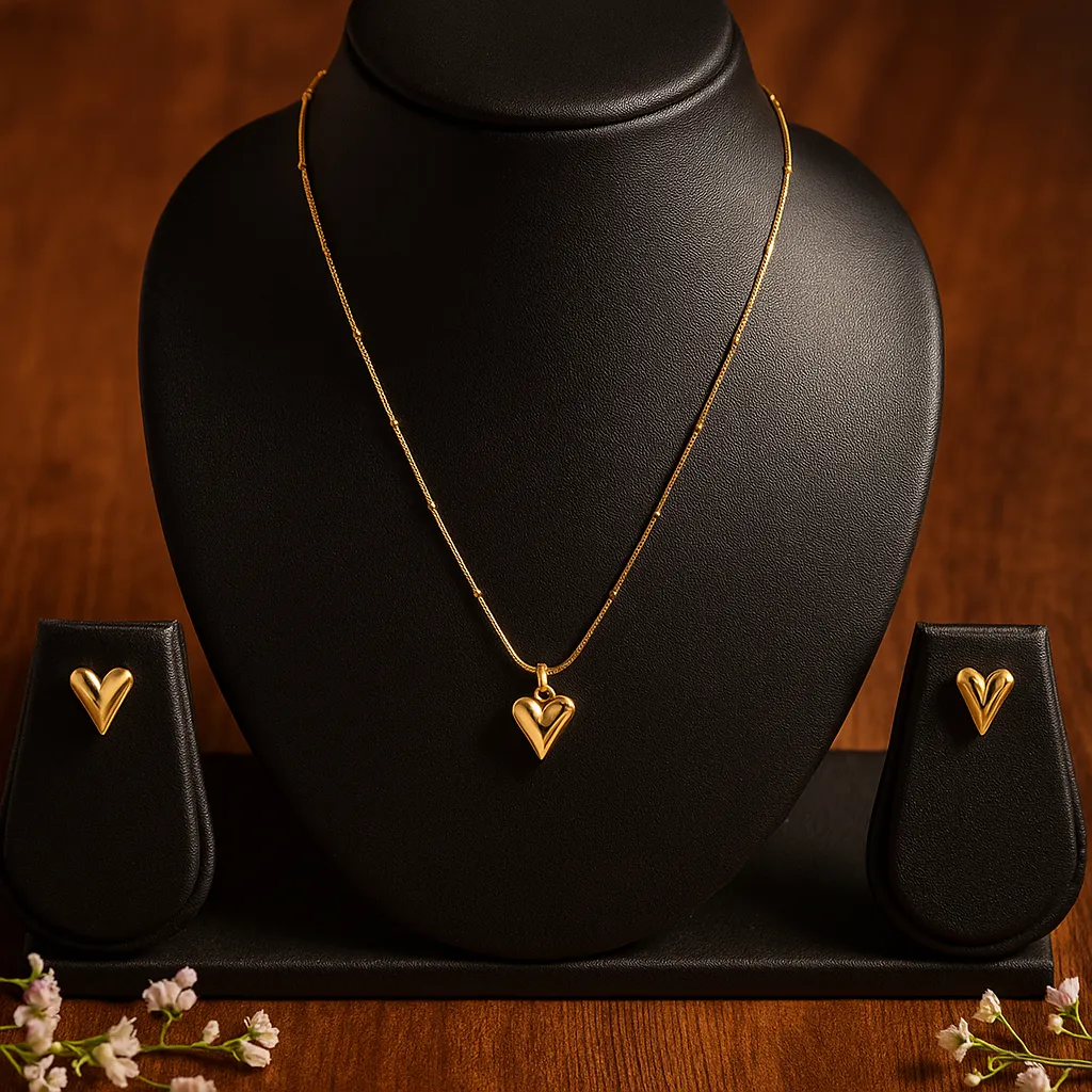 Gold polished heart design pendant set with matching earrings for women